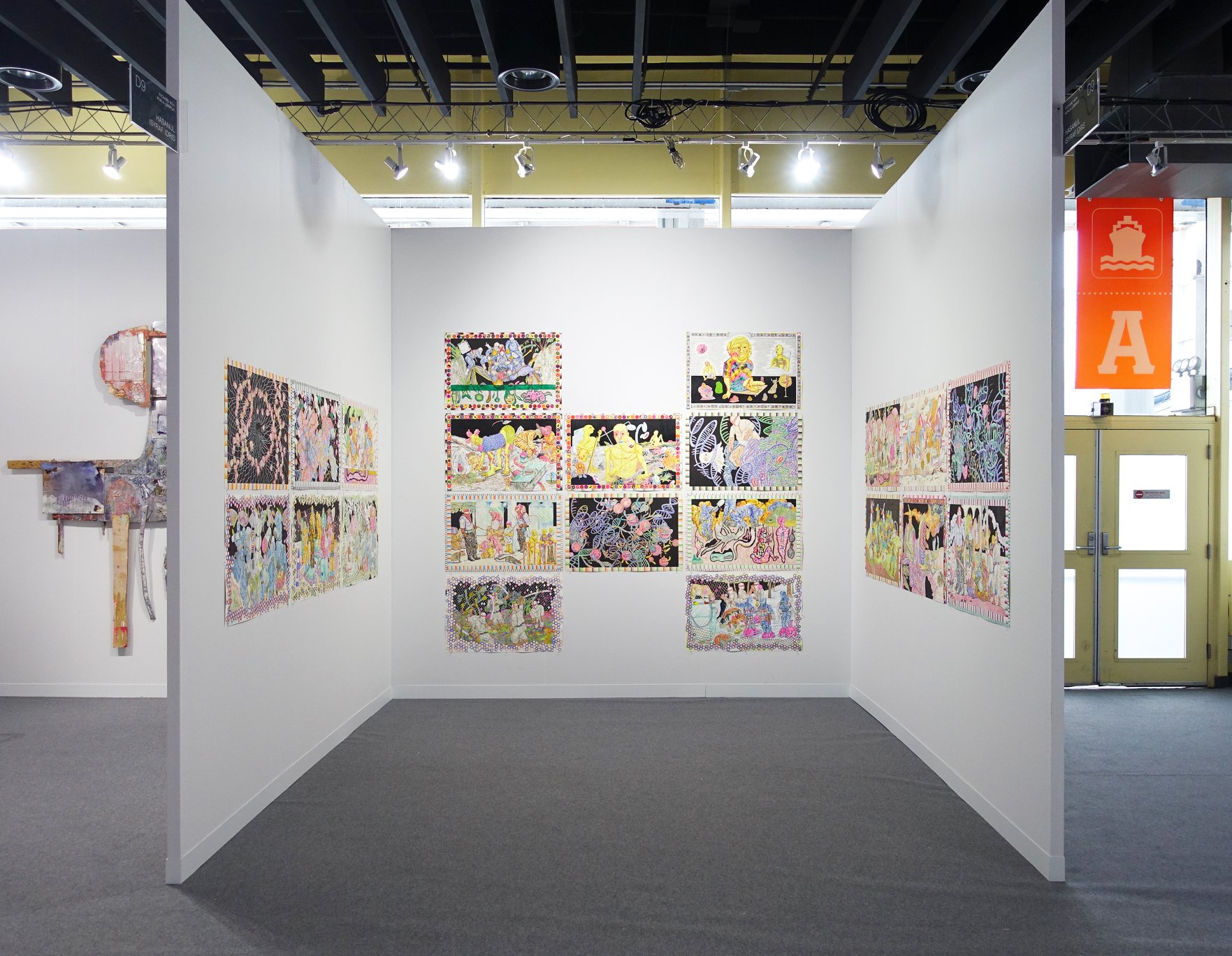 VOLTA New York 2018 booth with dense grid arrangement across three walls