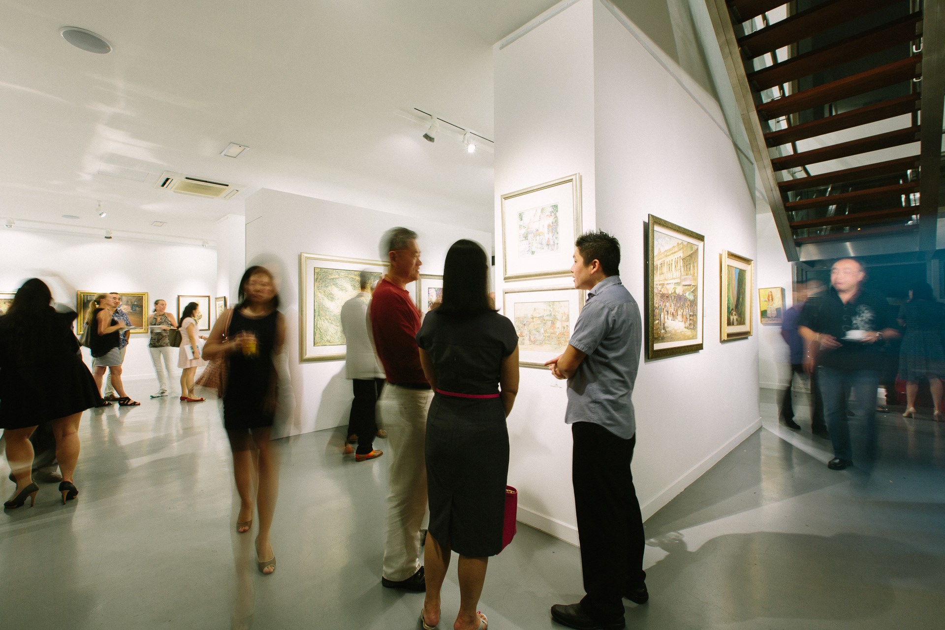 Pre-auction exhibition preview at separate venue before auction day